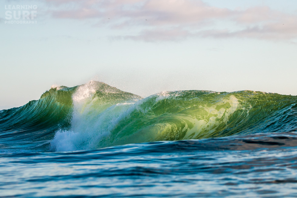 This backlit beauty broke deeper than the pack of surfers, some extra zoom would have helped, see below for the pre-crop version. ISO 125, 81mm, f4, 1/1000